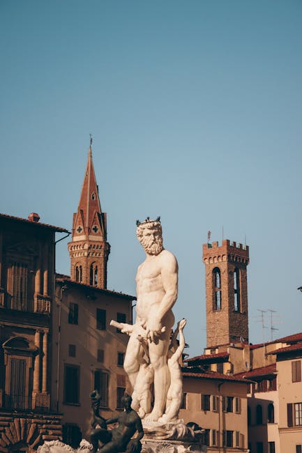 Neptune Fountain and medieval tower in Piazza della Signoria Florence