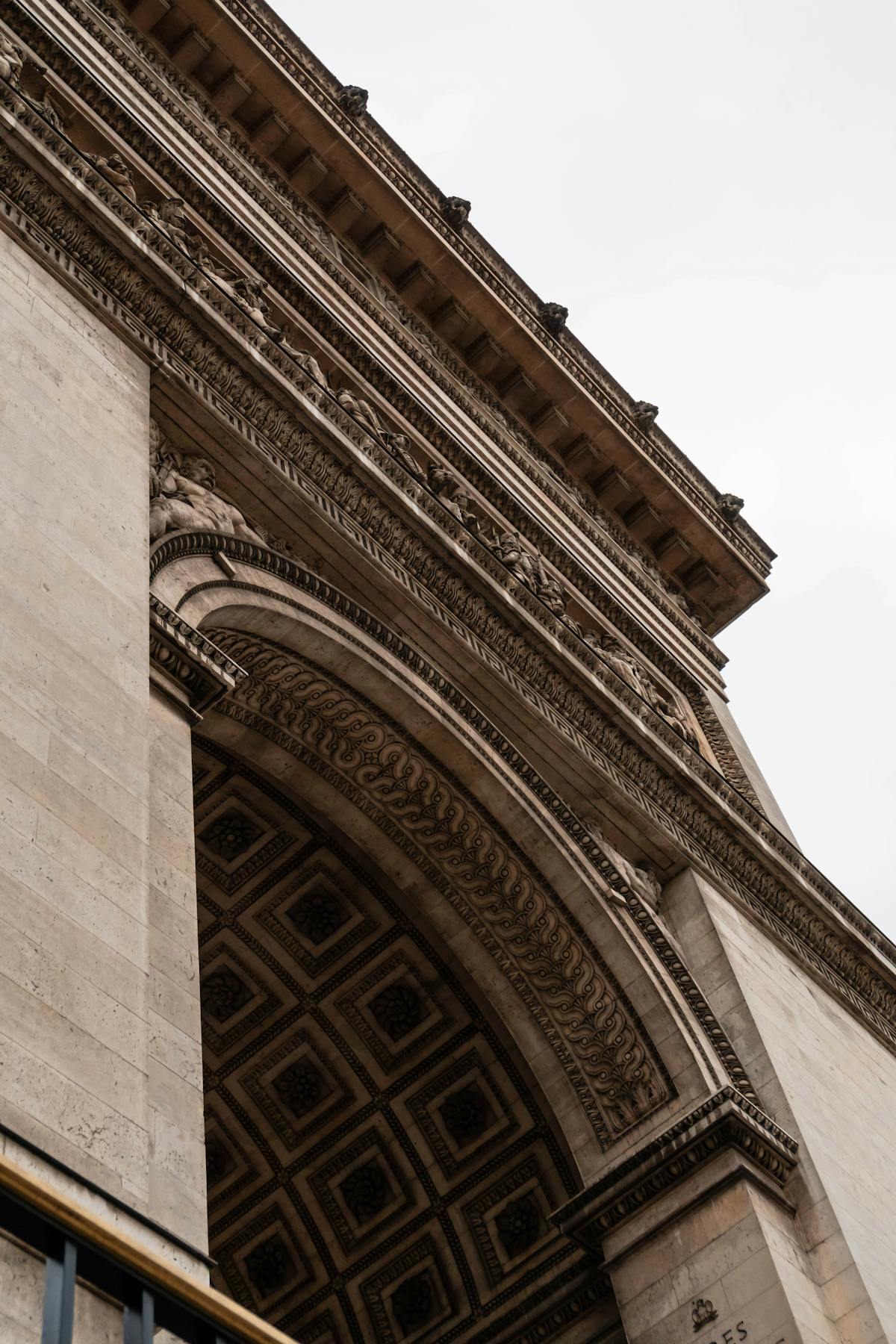 Close-up of the sculpted relief details on the Arc de Triomphe