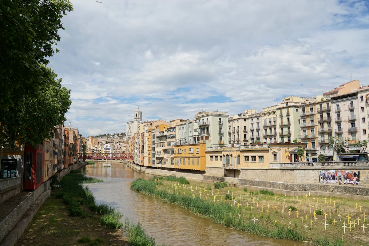 Painted houses lining the Onyar River in Girona old town