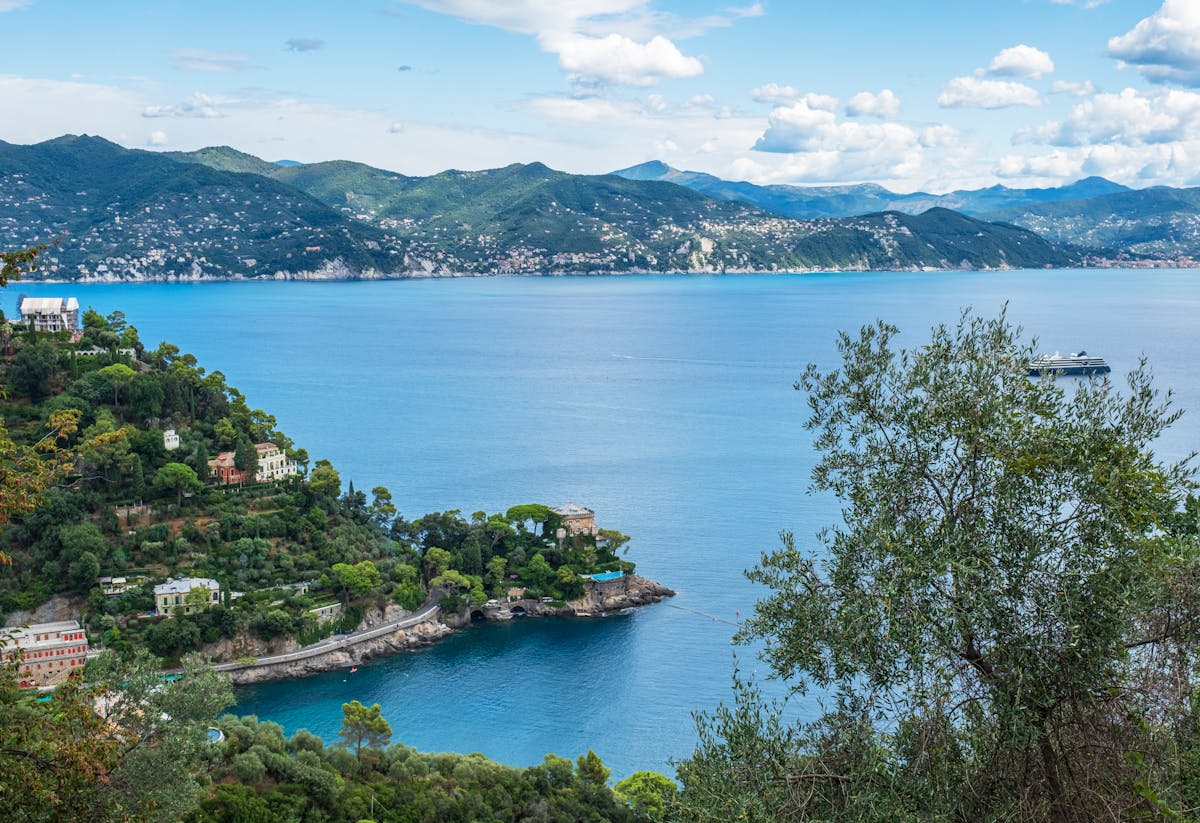Breathtaking view of the Ligurian coast with lush greenery and blue waters