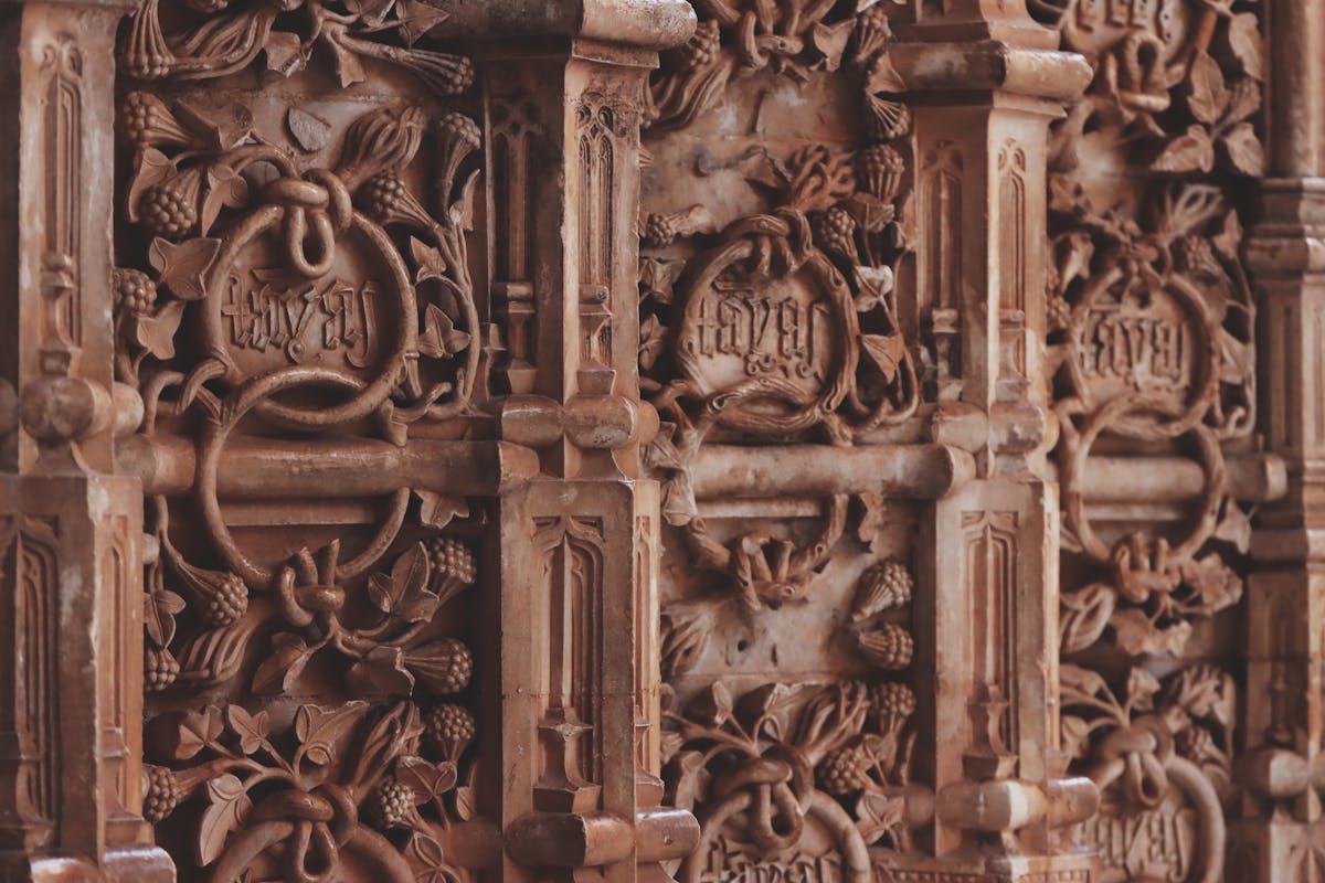 Detailed stone carvings on the exterior of Batalha Monastery in Portugal