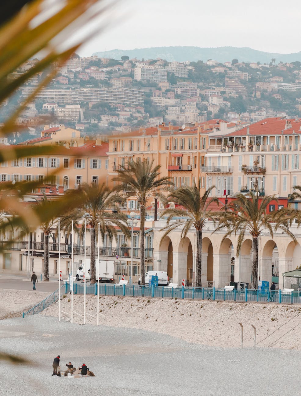 Nice beach and the Mediterranean Sea with the curved shoreline stretching into the distance