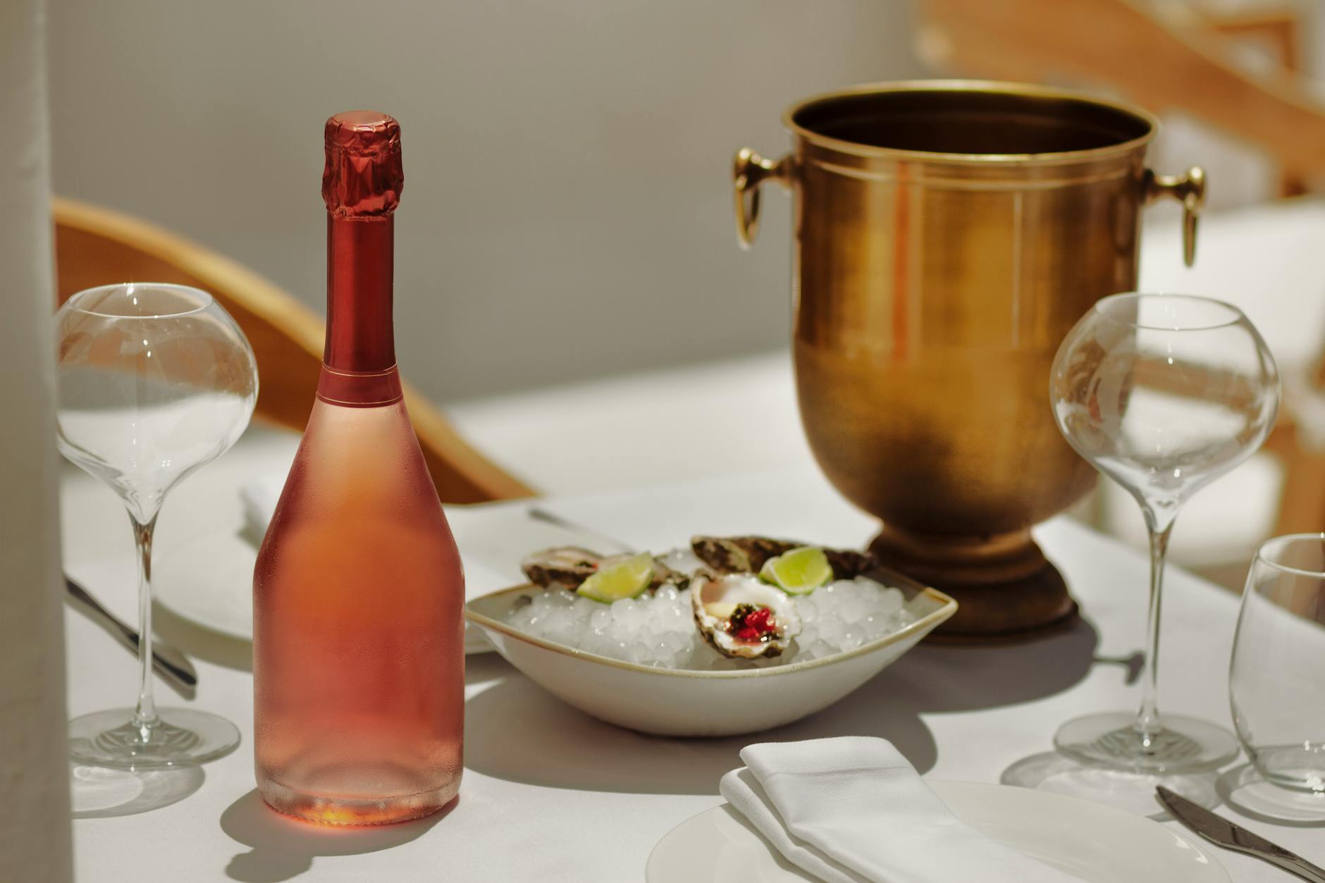 Wine glasses and French dining on a candlelit table