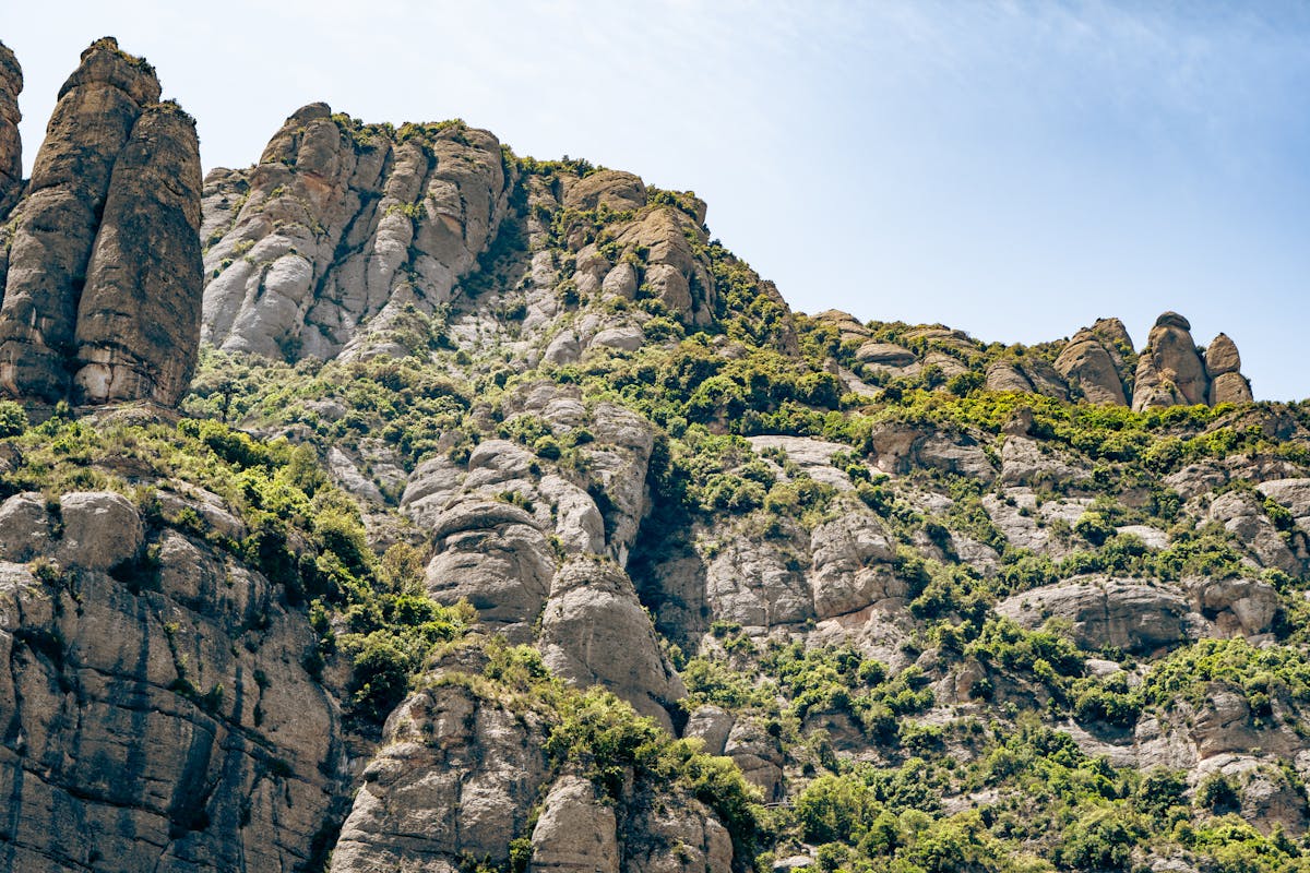A rocky trail through Mediterranean scrubland on Montserrat mountain