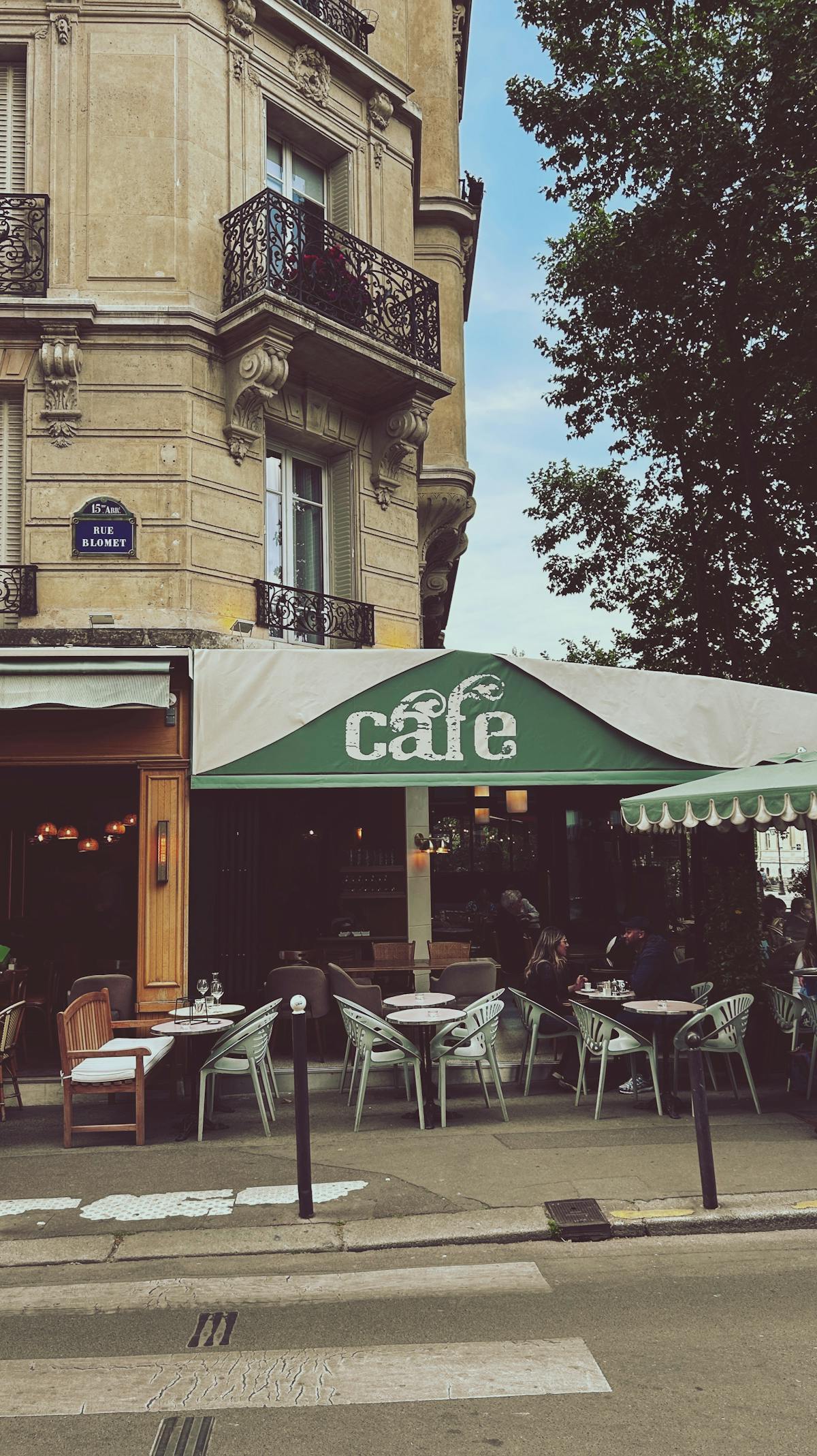 Classic Parisian sidewalk cafe with outdoor seating