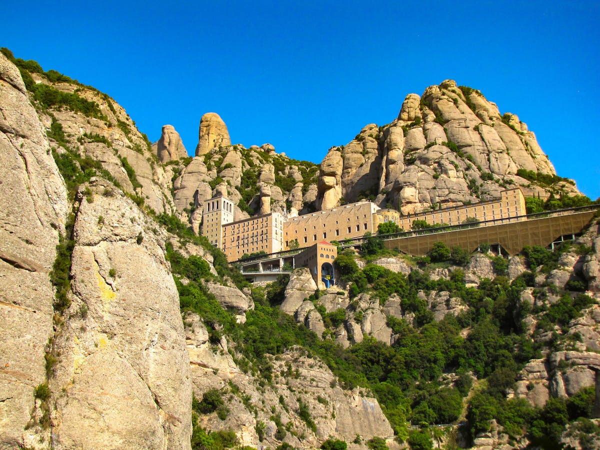 Montserrat monastery buildings tucked between towering rock spires