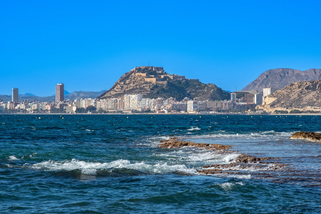 Alicante coastline with Santa Barbara Castle on a sunny day
