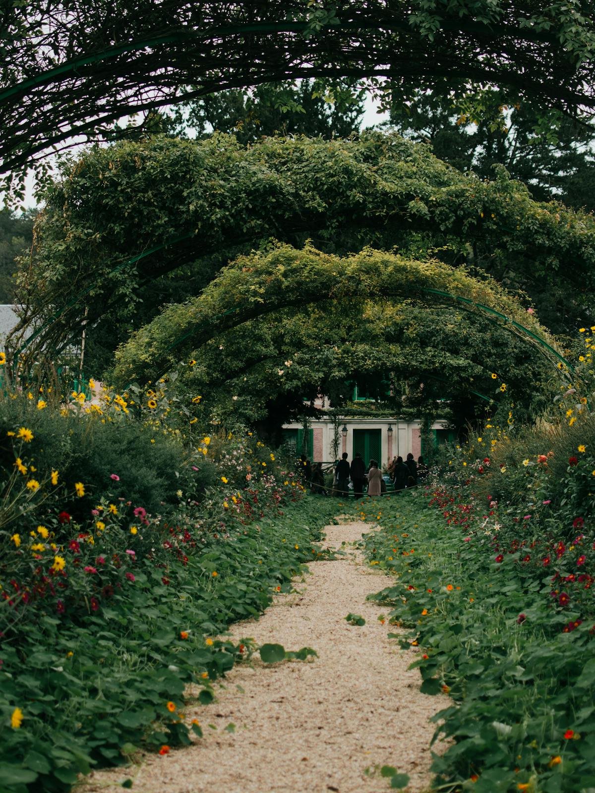 Floral archway leading to Monet house in Giverny