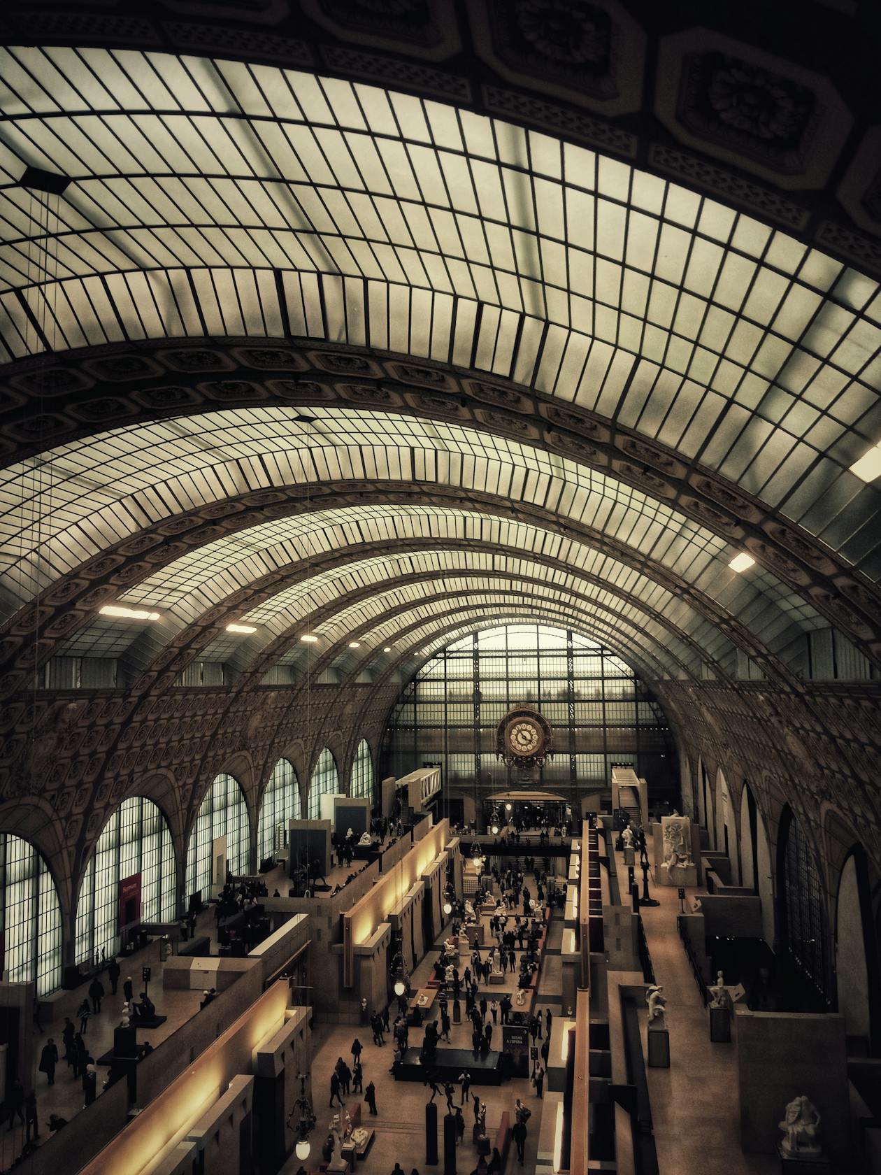 Visitors exploring the galleries of the Musee dOrsay from above