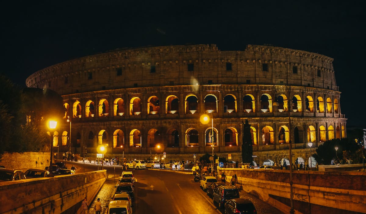 The Colosseum in Rome beautifully lit at night