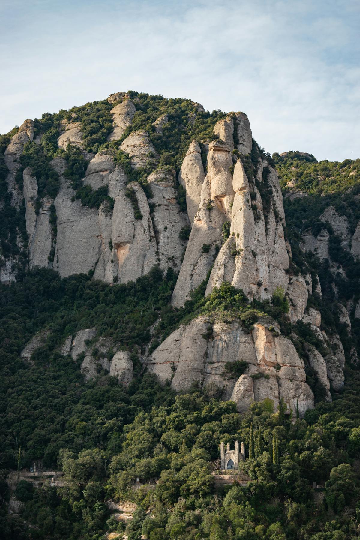 Cable car ascending the steep mountainside of Montserrat with valley views