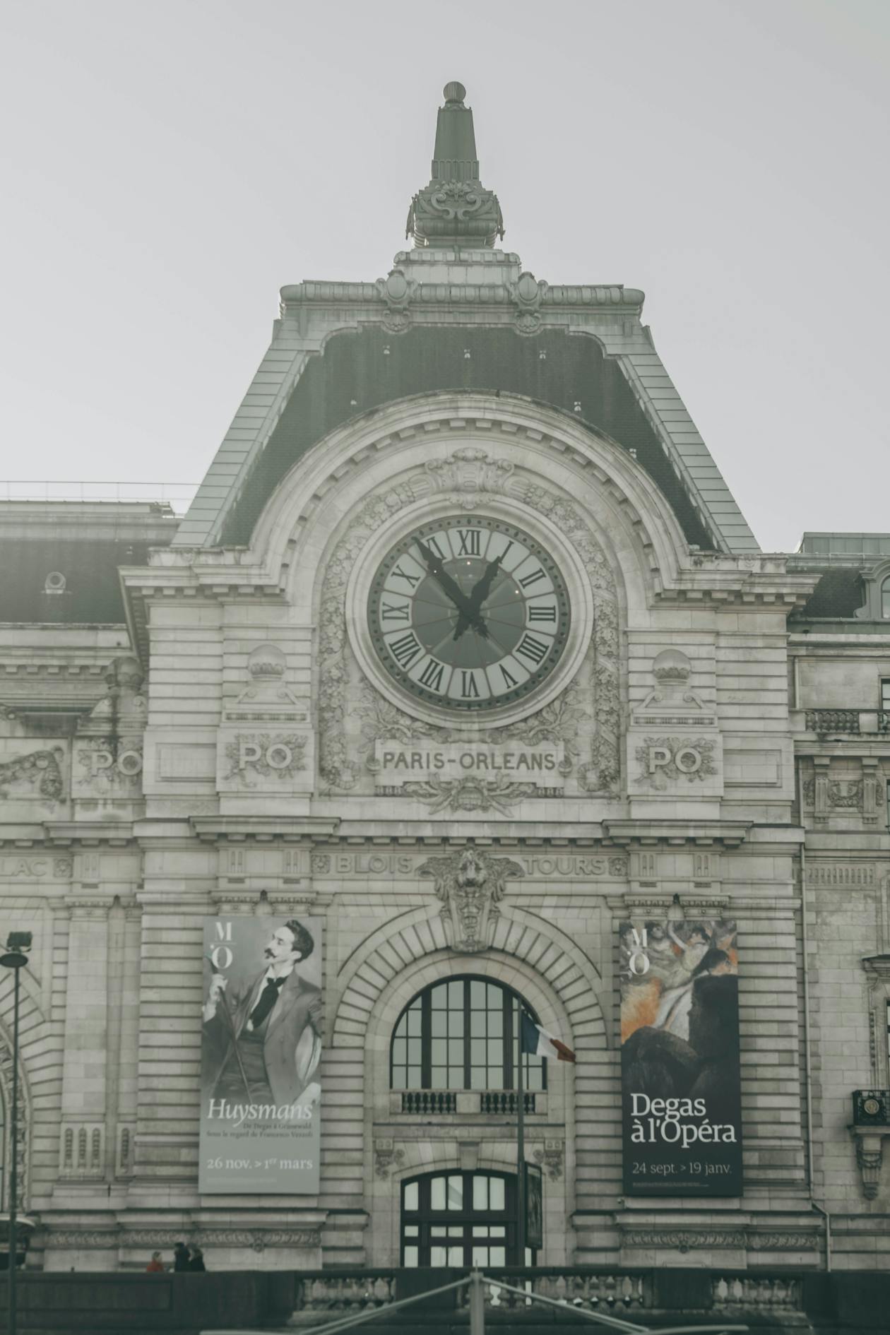 The famous clock face at the Musee dOrsay overlooking Paris