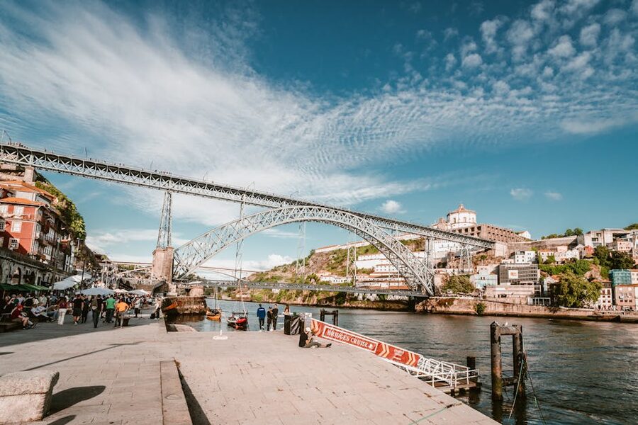 Dom Luis Bridge over the Douro River with Porto skyline in the background