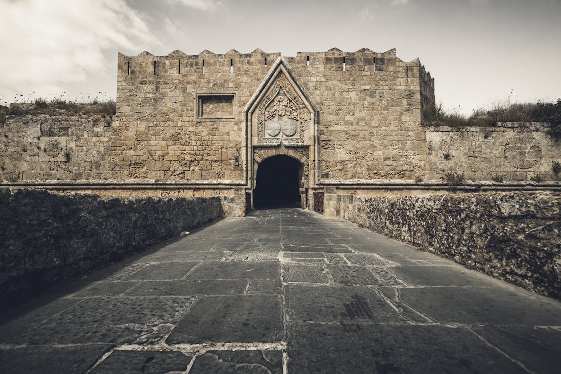 Stone gate entrance to Rhodes medieval castle Old Town