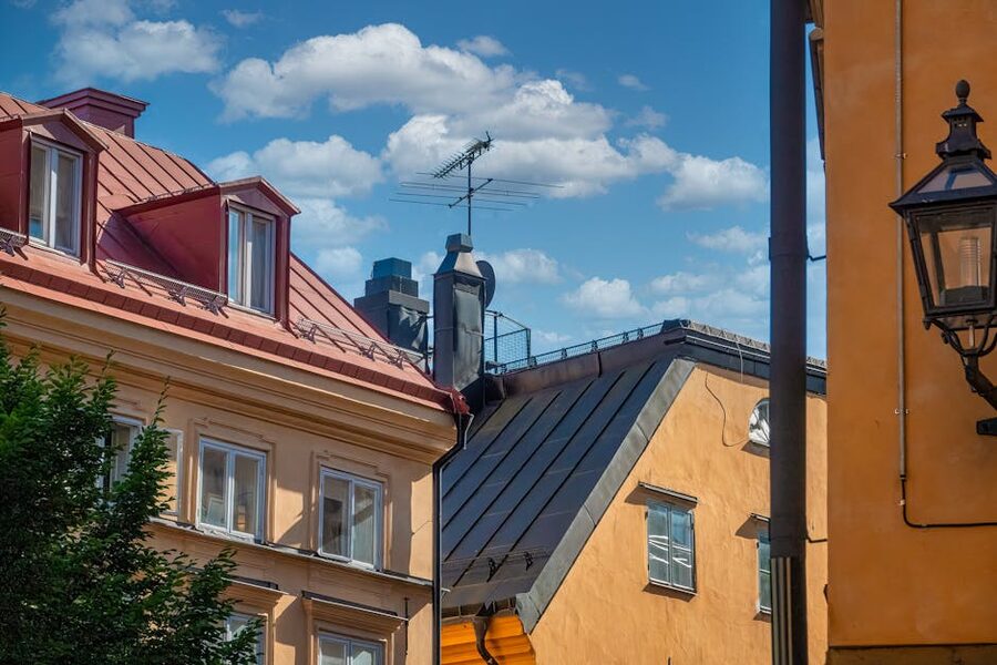 Stockholm rooftops under blue sky
