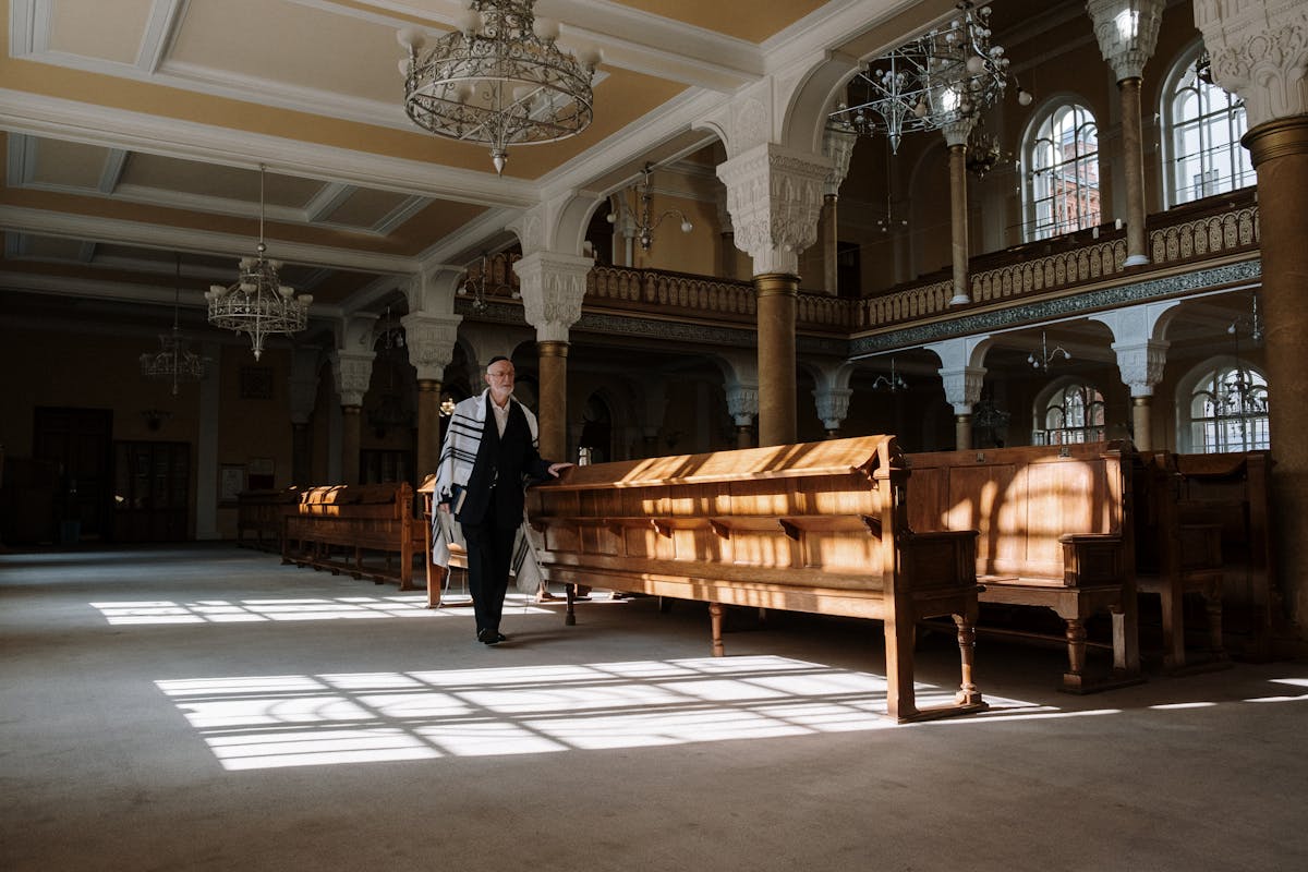 Interior of a synagogue with natural light streaming through windows