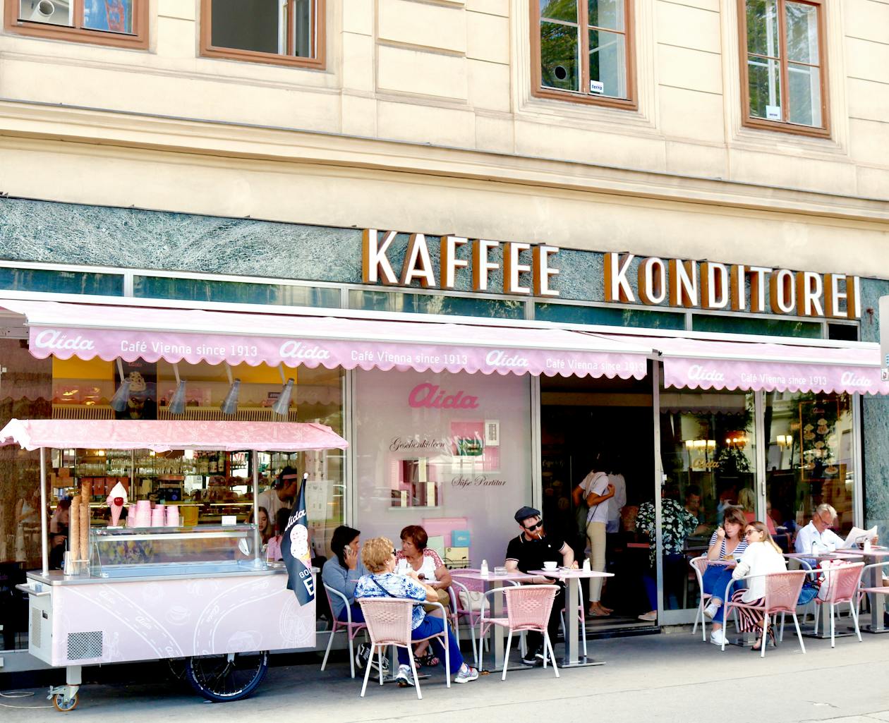 Outdoor cafe seating at a traditional Viennese coffeehouse