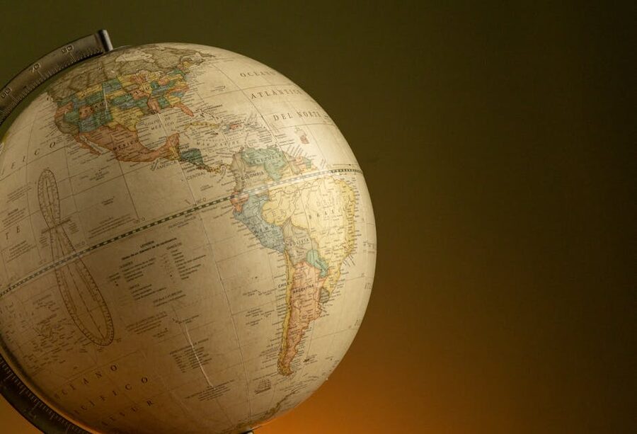 Vintage globe with map of the Americas in warm light