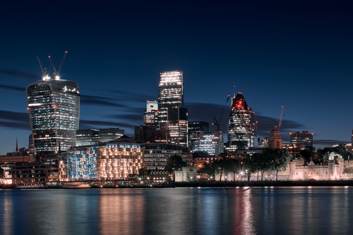 Breathtaking London skyline at night with modern skyscrapers and iconic architecture