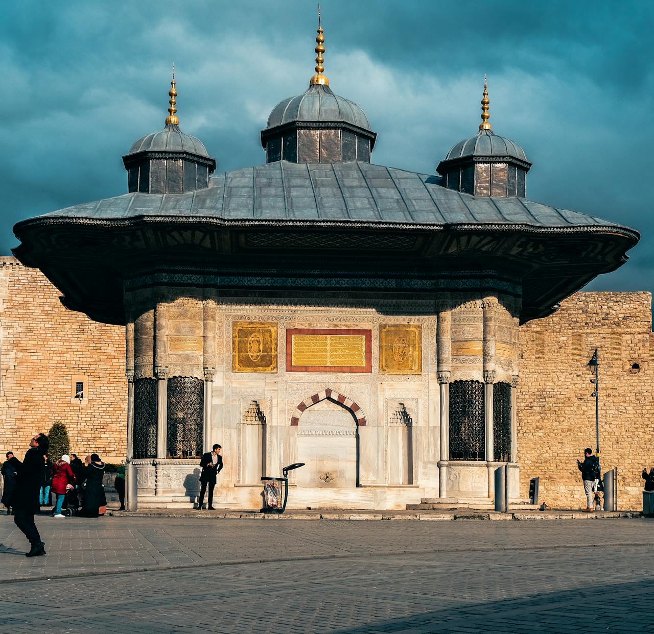 Ornate historical fountain in the courtyard of Topkapi Palace