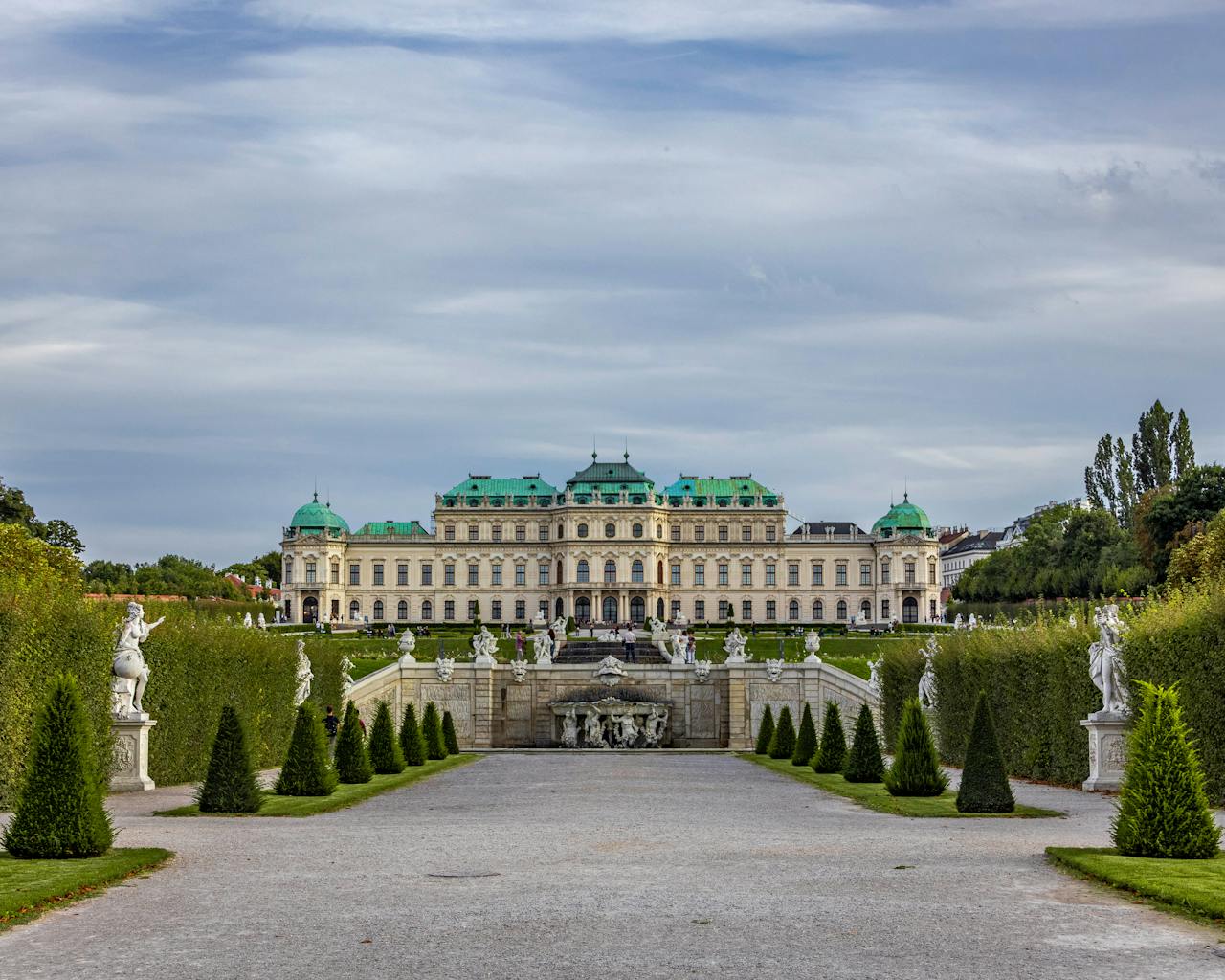 Gardens of Belvedere Palace Vienna with manicured hedges and baroque architecture