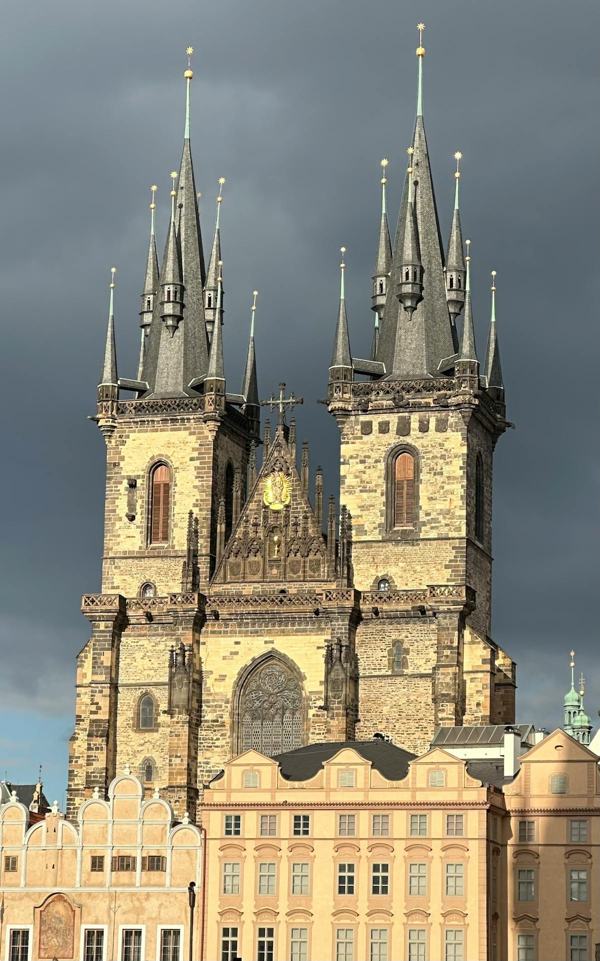 Gothic Church of Our Lady before Tyn in Prague's Old Town with dramatic skies