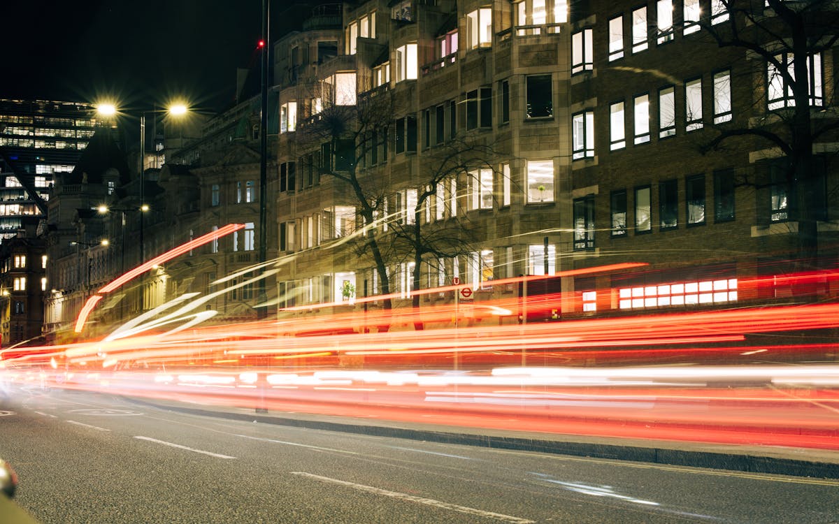 Long exposure photograph of London traffic creating light trails at night