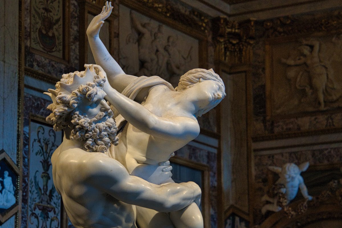 Detail of Bernini marble sculpture showing mythological scene at Borghese Gallery