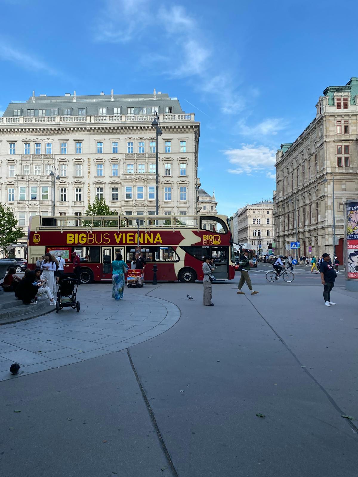 Big Bus tour vehicle on a Vienna street with classical buildings in the background