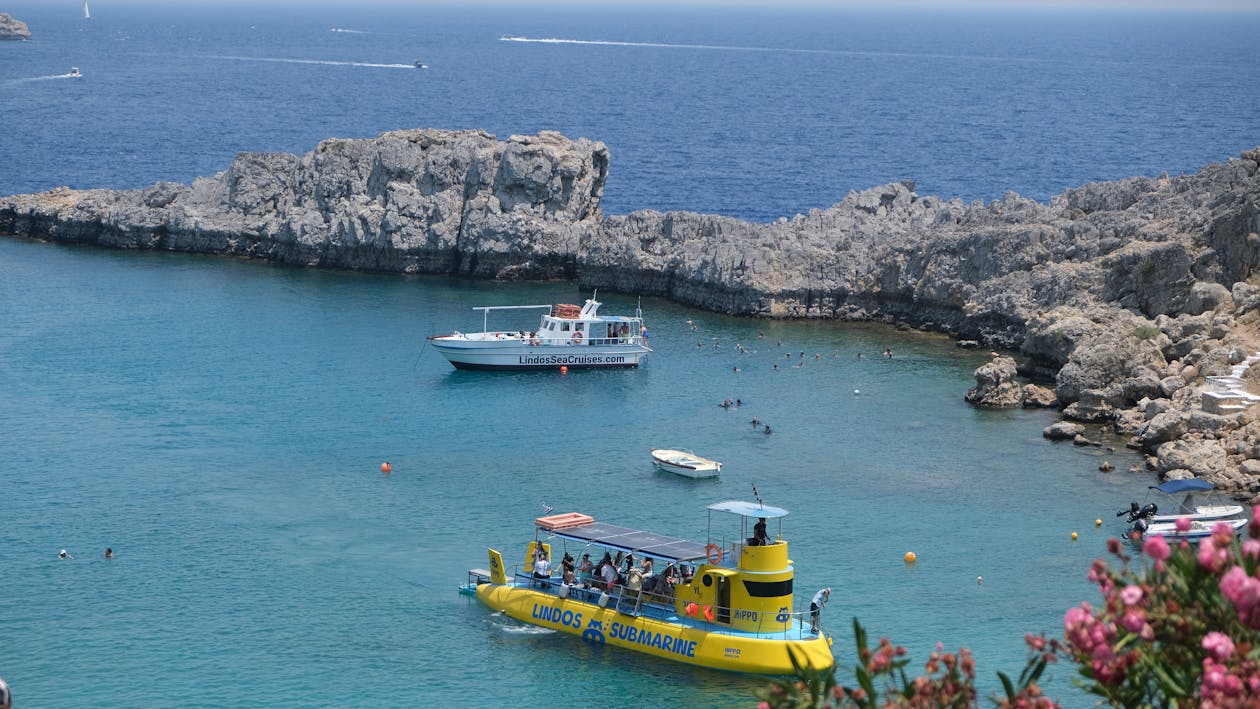 Boats anchored in the clear waters of Lindos Bay