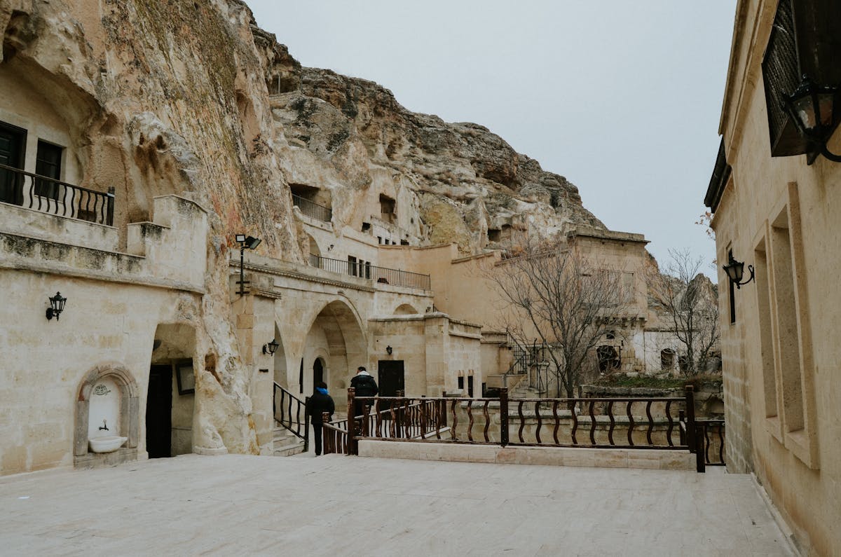 Ancient cave houses carved into rock formations in Cappadocia Turkey