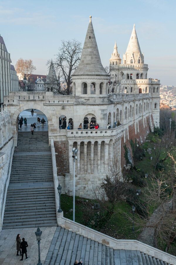 Visitors exploring the turrets of Fishermans Bastion in Budapest