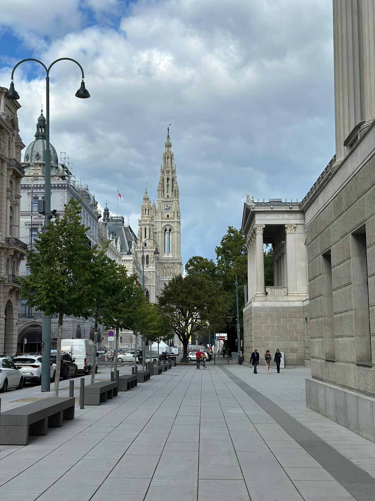 Historic architecture along Vienna's Ringstrasse boulevard under cloudy skies