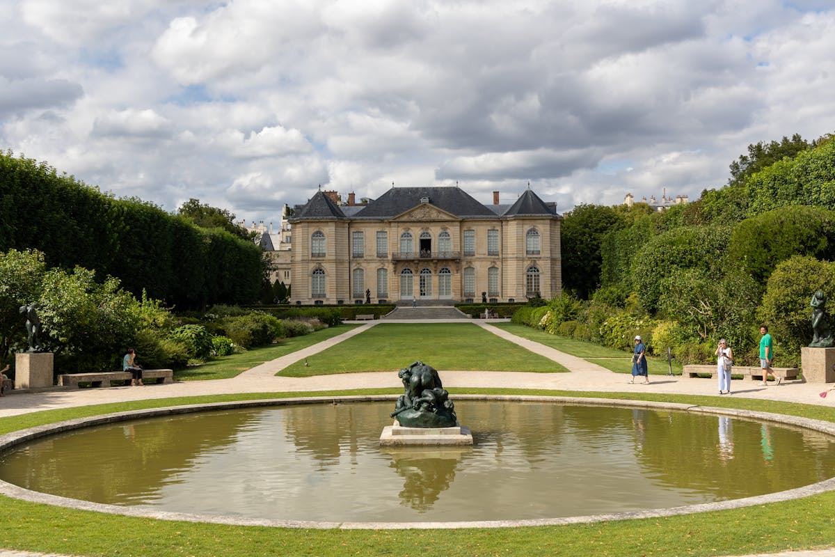 Sculptures among greenery in the Musee Rodin gardens Paris