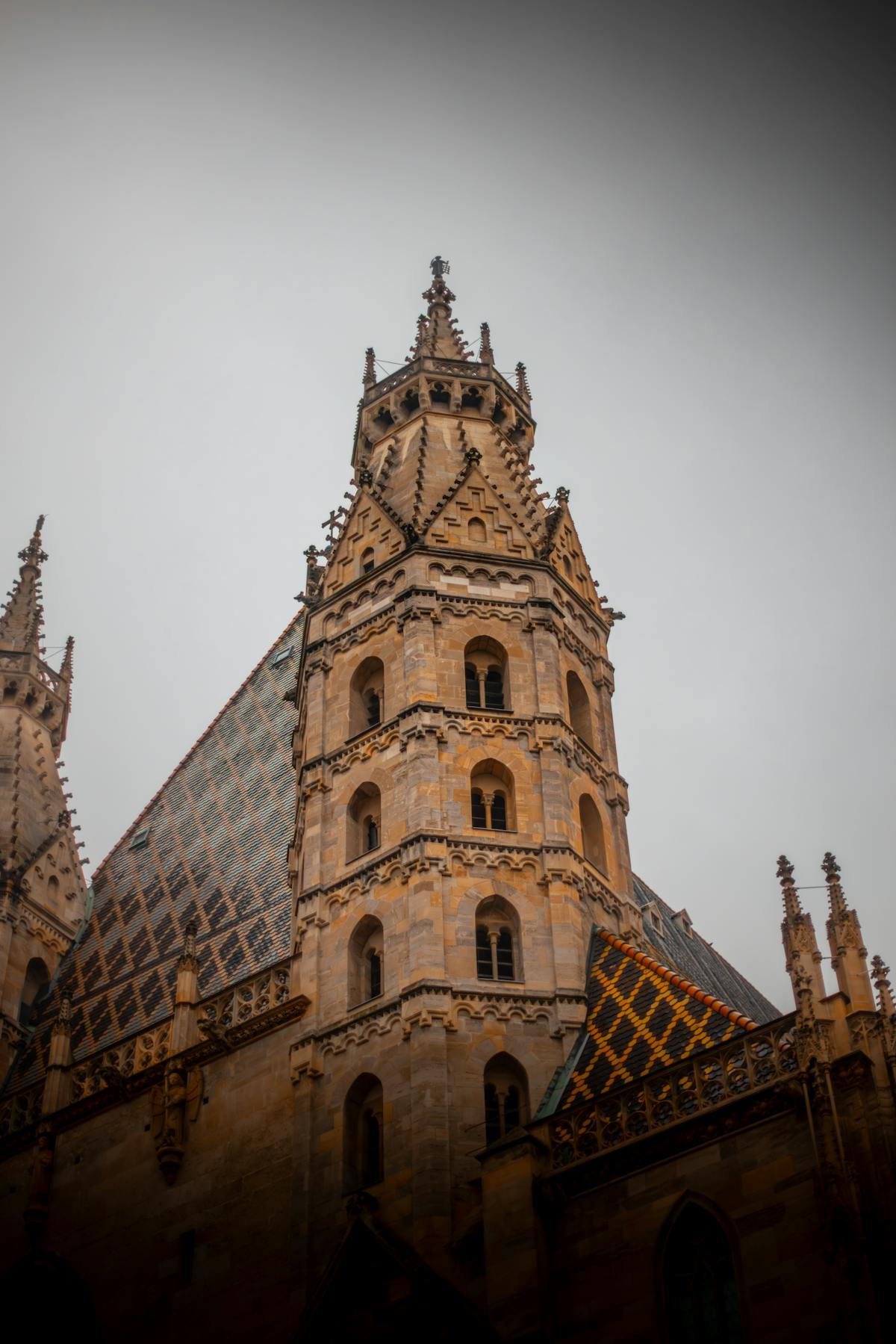 Detailed view of St. Stephen's Cathedral colourful tile roof in Vienna