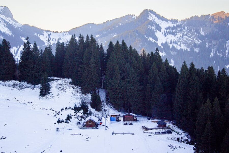 Snowy alpine landscape with cabins near Pilatus