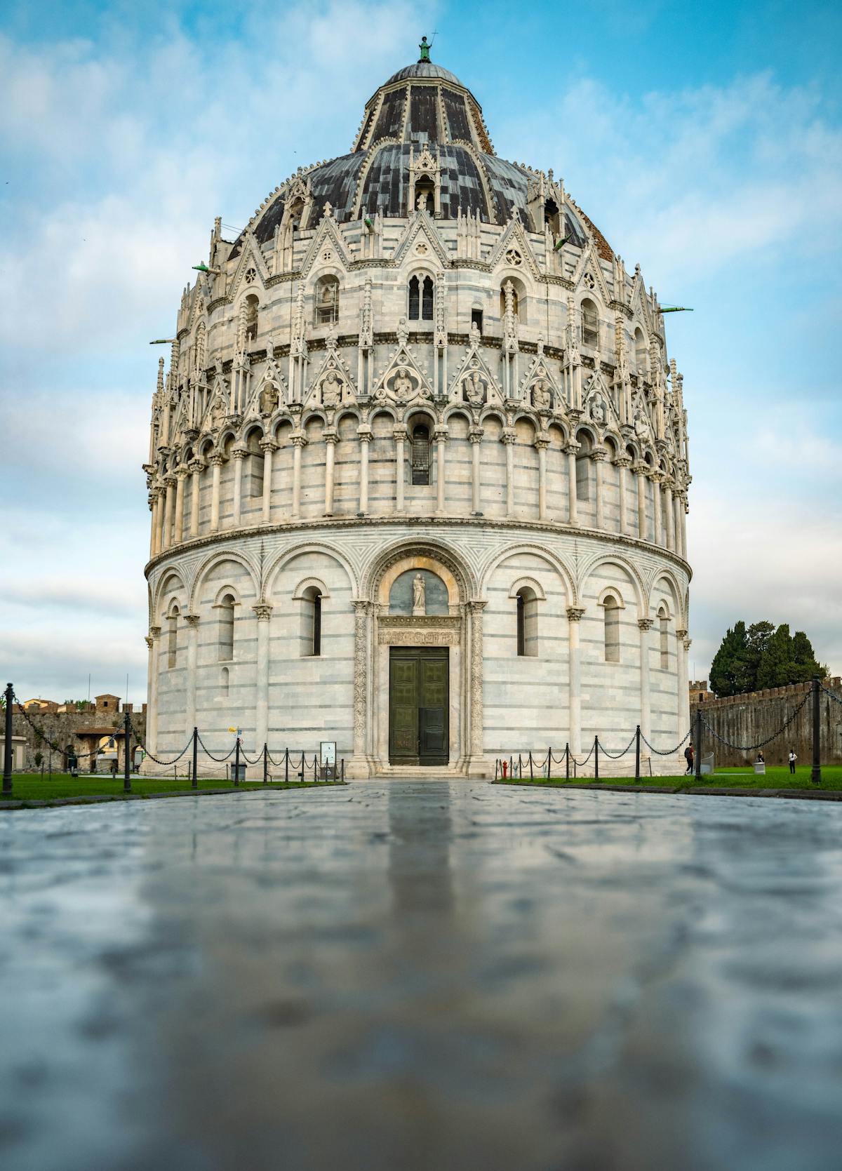 Detailed view of the ornate marble facade of Pisa Cathedral