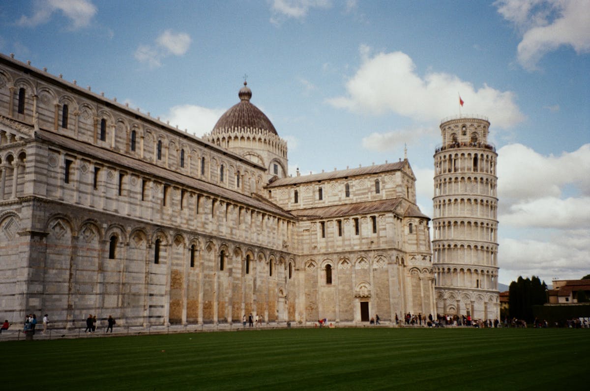 The Leaning Tower of Pisa and Pisa Cathedral together in Piazza dei Miracoli