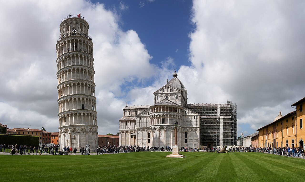 Wide panoramic view of the entire Piazza dei Miracoli complex in Pisa