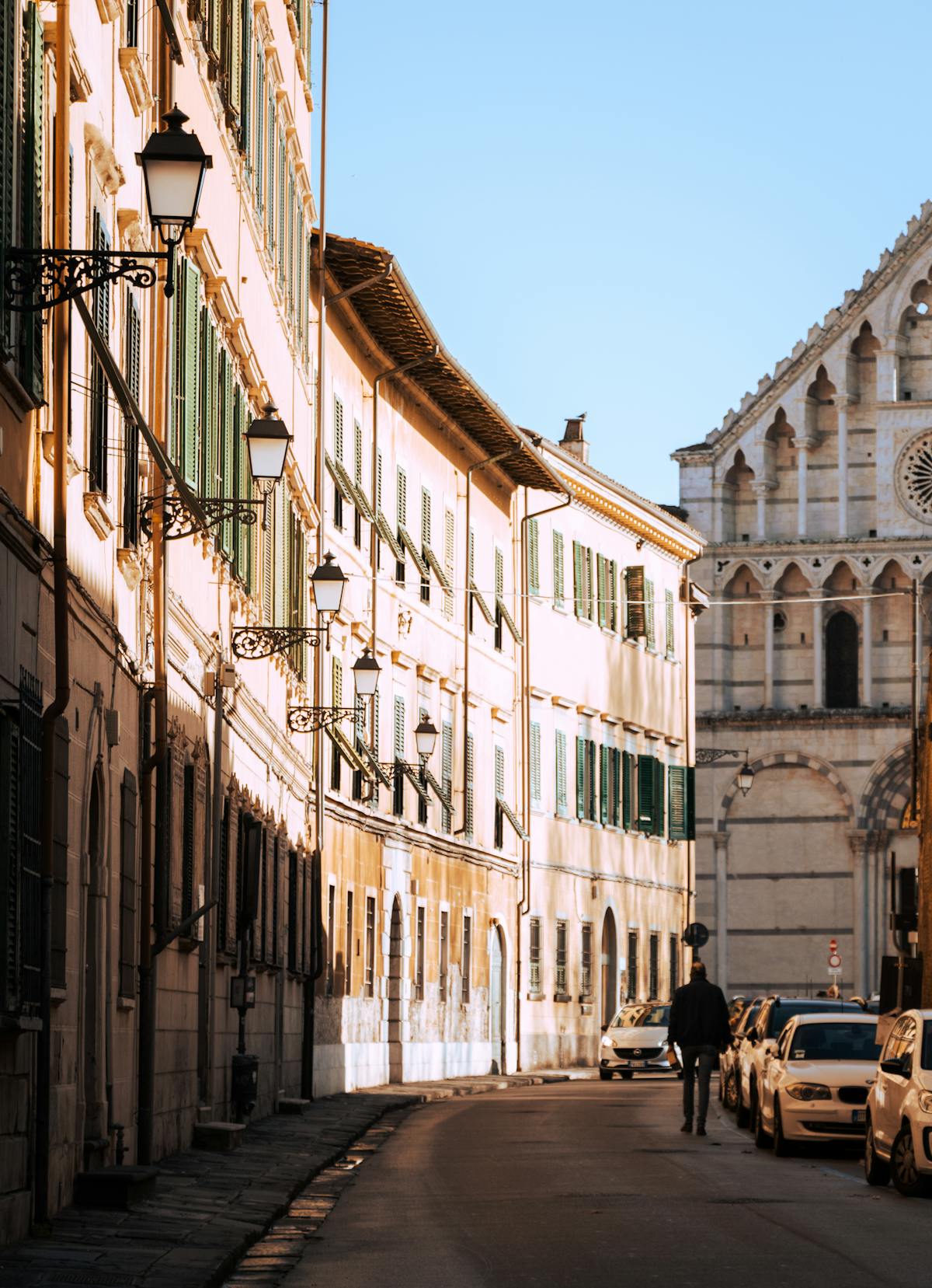 Colorful buildings along a historic street in Pisa Italy