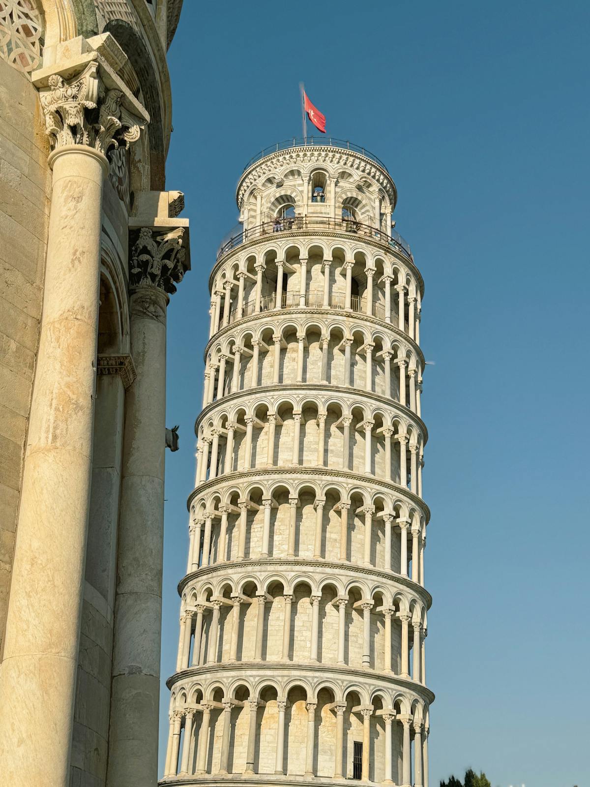 The Leaning Tower and Pisa Cathedral seen together at golden hour