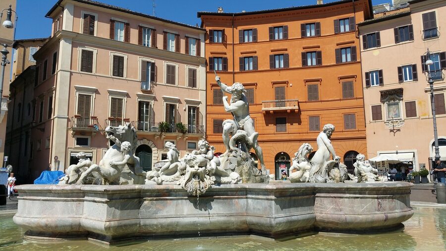 Fountain of Neptune statue and water feature in Piazza Navona