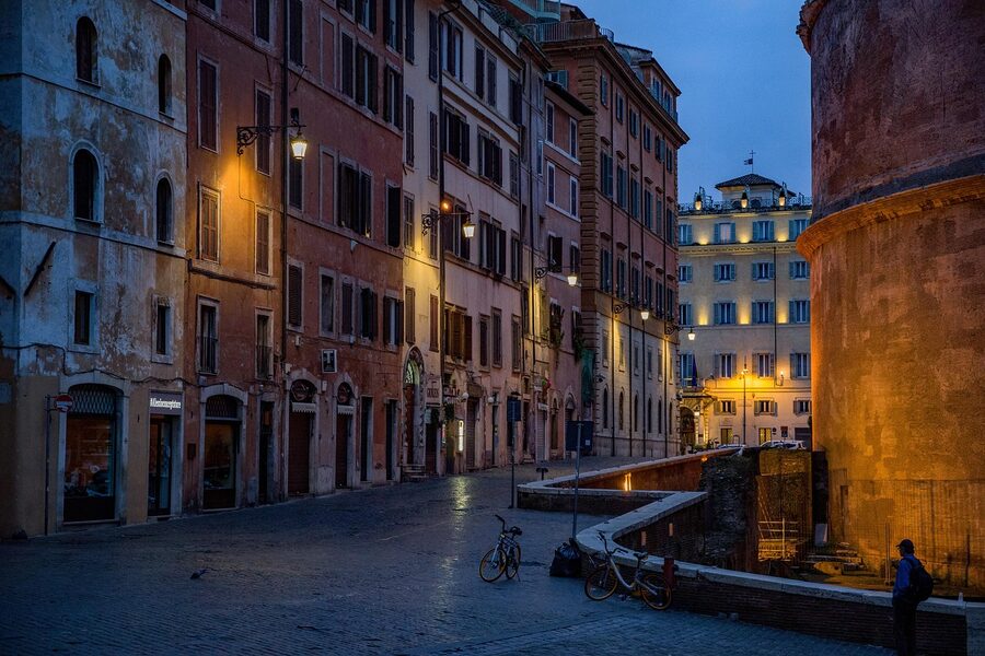 Cobblestone street in Rome with the Pantheon visible in the background