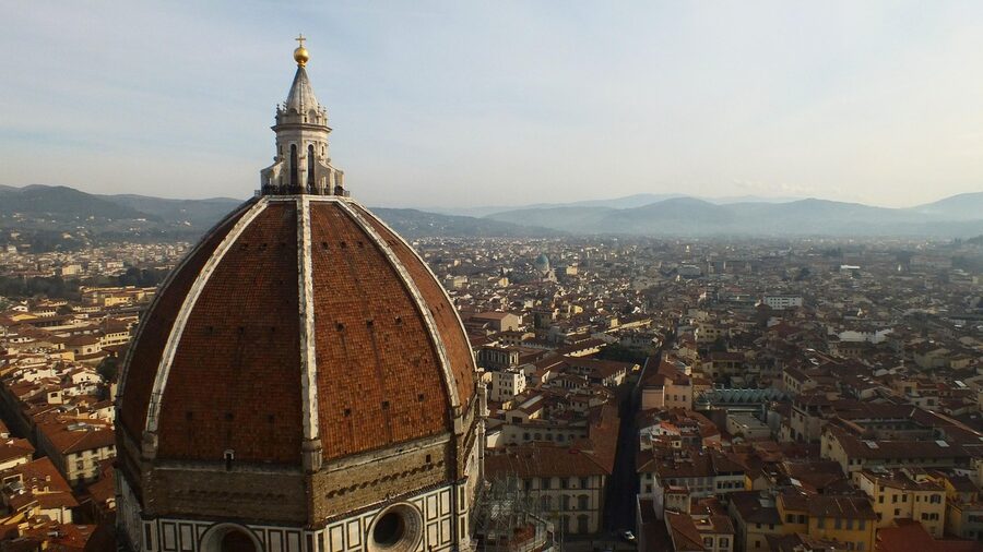 Florence cityscape showing the Duomo dome towering above the terracotta rooftops