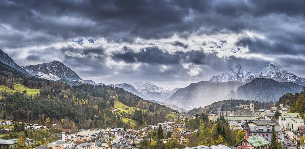 Panoramic view of the Berchtesgaden Alps mountain range with rocky peaks and green valleys