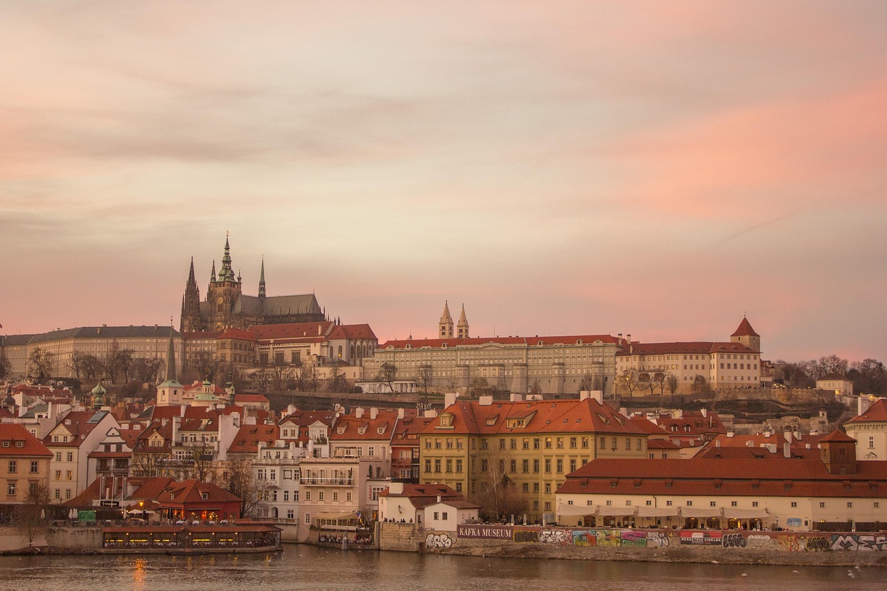 Prague Old Town architecture with Prague Castle visible on the hilltop in the background