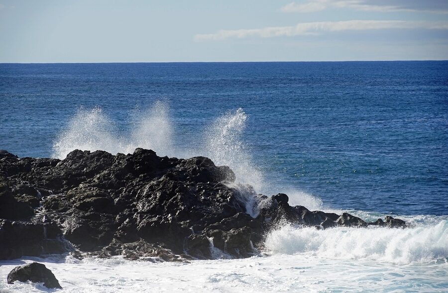 Rocky volcanic coast with Atlantic surf at El Golfo in Lanzarote