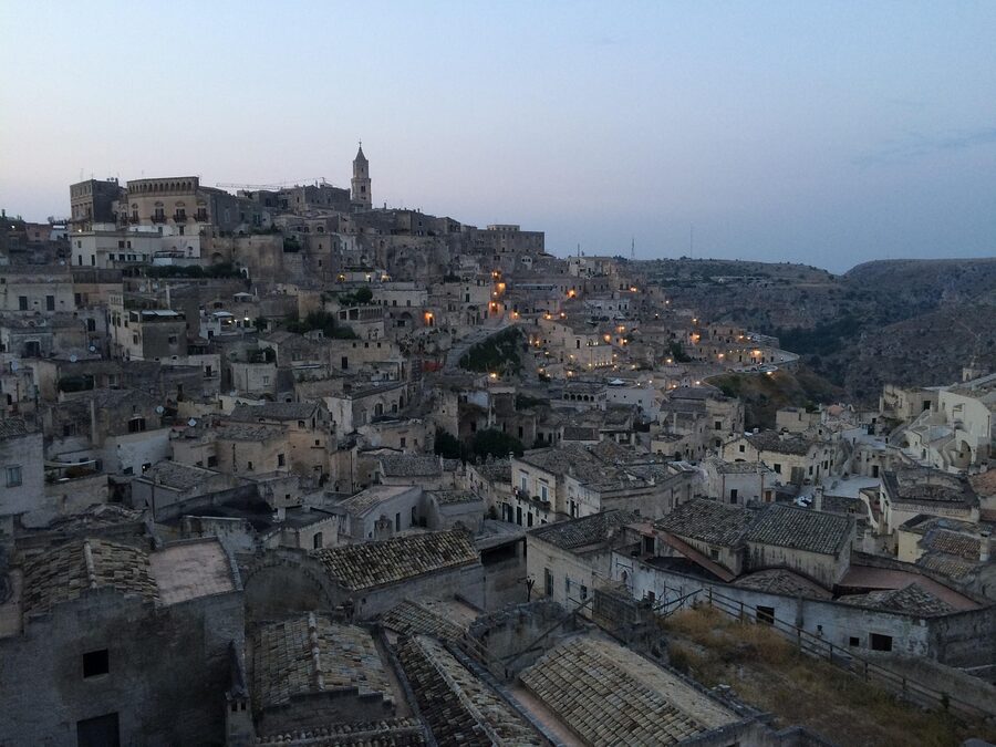 Wide panoramic view of Matera Sassi cave dwellings and the ravine
