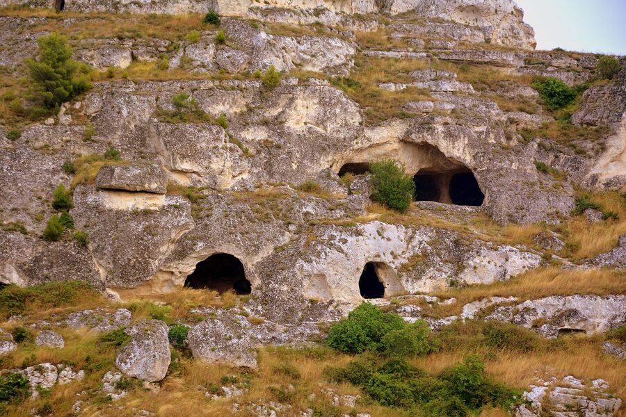 Traditional cave house carved into limestone in the Sassi di Matera