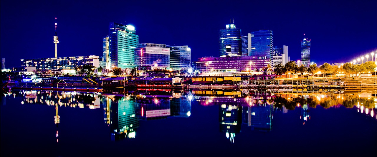Nighttime panoramic view of Vienna skyline with city lights